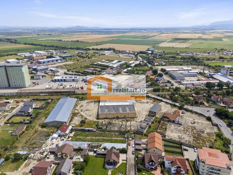 Codlea, depozite si teren 1,7 ha, 5600 mp cladiri, D 155 ml la DJ112A, acces E60.