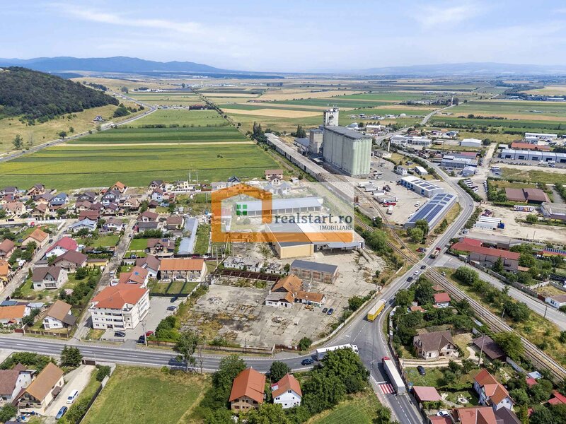 Codlea, depozite si teren 1,7 ha, 5600 mp cladiri, D 155 ml la DJ112A, acces E60.